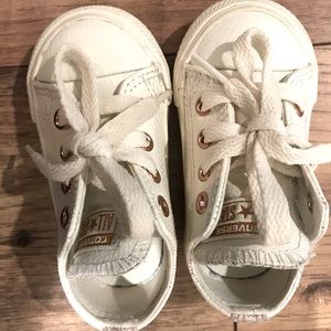 Rose gold and white leather converse